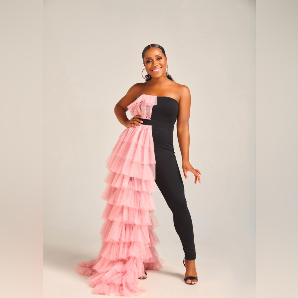 Black jumpsuit with pink tulle overlay. Worn once for a photoshoot.